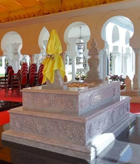 almarhumah