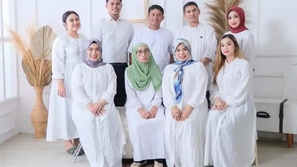 almarhumah